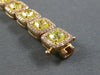 LARGE PINK & INTENSE FANCY YELLOW DIAMOND 18K YELLOW & ROSE GOLD TENNIS BRACELET