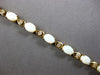 4.6CT DIAMOND & AAA OPAL 14KT YELLOW GOLD OVAL & ROUND ETERNITY BRACELET 28192