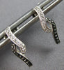 ESTATE .13CT WHITE & BLACK DIAMOND 14K WHITE & BLACK GOLD INFINITY STUD EARRINGS