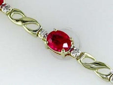 2.37CT DIAMOND & AAA RUBY 14KT YELLOW GOLD OVAL & ROUND 3 STONE TENNIS BRACELET