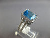 6.40CT DIAMOND & AAA BLUE TOPAZ 14KT WHITE GOLD 3D EMERALD CUT & ROUND HALO RING