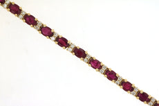 7.02CT DIAMOND & AAA RUBY 14KT YELLOW GOLD CLASSIC OVAL & ROUND TENNIS BRACELET