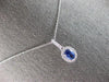 1.28CT DIAMOND & AAA CEYLON SAPPHIRE 14KT WHITE GOLD OVAL HALO FLOATING PENDANT