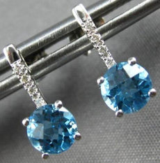1.13CT DIAMOND & AAA BLUE TOPAZ 14KT WHITE GOLD ROUND SOLITAIRE HANGING EARRINGS