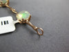 5.12CT DIAMOND & AAA OPAL 14KT ROSE GOLD OVAL & ROUND BAMBOO TENNIS BRACELET