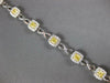 4.69CT WHITE & FANCY YELLOW DIAMOND 18K 2 TONE GOLD CUSHION HALO TENNIS BRACELET