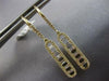 LONG .55CT DIAMOND 14KT YELLOW GOLD ROUND & BAGUETTE ELONGATED OVAL FUN EARRINGS