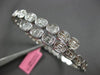 2.67CT DIAMOND 18K WHITE GOLD OVAL BEZEL INVISIBLE SEMI ETERNITY BANGLE BRACELET