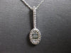 .25CT DIAMOND 14KT WHITE GOLD 3D ROUND & BAGUETTE OVAL TENNIS RACKET FUN PENDANT