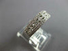 .75CT DIAMOND 18KT WHITE GOLD ROUND & PRINCESS 3 ROW FILIGREE ANNIVERSARY RING