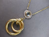 LARGE .61CT DIAMOND & AAA LIGHT BLUE TOPAZ 14KT 2 TONE GOLD 3D CIRCULAR NECKLACE