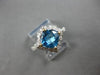 1.88CT DIAMOND & AAA BLUE TOPAZ 14K 2 TONE GOLD CUSHION & ROUND GEOMETRICAL RING