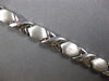 ESTATE WIDE 14KT WHITE GOLD 3D CLASSIC MATTE & SHINY XO LOVE BRACELET