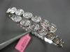 2.67CT DIAMOND 18K WHITE GOLD OVAL BEZEL INVISIBLE SEMI ETERNITY BANGLE BRACELET