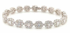 8.13CT DIAMOND 18KT WHITE GOLD 3D ROUND & BAGUETTE MULTI FLOWER TENNIS BRACELET