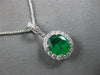 2.03CT DIAMOND & AAA EMERALD 18KT WHITE GOLD OVAL & ROUND HALO FLOATING PENDANT