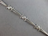 .26CT DIAMOND 14KT WHITE GOLD ROUND BEZEL ETOILE TRIANGULAR FUN TENNIS BRACELET