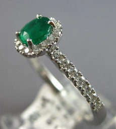 .72CT DIAMOND & AAA EMERALD 18KT WHITE GOLD 3D OVAL & ROUND HALO ENGAGEMENT RING