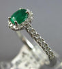 .72CT DIAMOND & AAA EMERALD 18KT WHITE GOLD 3D OVAL & ROUND HALO ENGAGEMENT RING