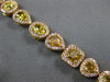 WIDE GIA 9.73CT MULTI COLOR DIAMOND 18KT YELLOW GOLD MULTI SHAPE TENNIS BRACELET