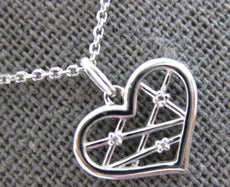 ESTATE .01CT DIAMOND 14K WHITE GOLD ROUND CRISS CROSS HEART FUN FLOATING PENDANT