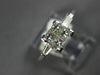 .50CT DIAMOND 18KT WHITE GOLD PRINCESS & BAGUETTE 3D INVISIBLE ENGAGEMENT RING