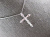 .33CT DIAMOND 18KT WHITE GOLD 3D CLASSIC ROUND & BAGUETTE CROSS FLOATING PENDANT