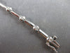ESTATE .56CT DIAMOND 14K WHITE GOLD ROUND BEZEL BY THE YARD LOVE TENNIS BRACELET