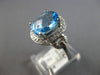 3.53CT DIAMOND & AAA BLUE TOPAZ 14KT WHITE GOLD OVAL & ROUND HALO LOVE KNOT RING