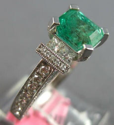 2.48CT DIAMOND & AAA EMERALD 18KT WHITE GOLD BAGUETTE & PRINCESS ENGAGEMENT RING