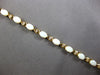 4.6CT DIAMOND & AAA OPAL 14KT YELLOW GOLD OVAL & ROUND ETERNITY BRACELET 28192