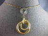 LARGE .61CT DIAMOND & AAA LIGHT BLUE TOPAZ 14KT 2 TONE GOLD 3D CIRCULAR NECKLACE