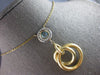 LARGE .61CT DIAMOND & AAA LIGHT BLUE TOPAZ 14KT 2 TONE GOLD 3D CIRCULAR NECKLACE