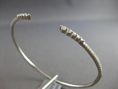 .49CT DIAMOND 18KT WHITE GOLD ROUND GRADUATING JOURNEY FLEXIBLE BANGLE BRACELET