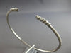.49CT DIAMOND 18KT WHITE GOLD ROUND GRADUATING JOURNEY FLEXIBLE BANGLE BRACELET