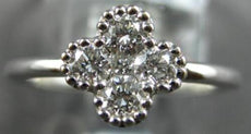 .56CT DIAMOND 18KT WHITE GOLD ROUND & PRINCESS 5 STONE FLOWER FILIGREE LOVE RING