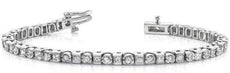 4.22CT DIAMOND 14KT WHITE GOLD ROUND & PRINCESS BEZEL & CHANNEL TENNIS BRACELET