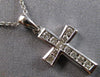 ESTATE SMALL .22CT DIAMOND 14KT WHITE GOLD ROUND CHANNEL CROSS FLOATING PENDANT