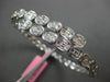 2.67CT DIAMOND 18K WHITE GOLD OVAL BEZEL INVISIBLE SEMI ETERNITY BANGLE BRACELET