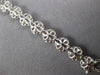 1.53CT DIAMOND 18KT WHITE GOLD INVISIBLE FLOWER ADJUSTABLE LOVE TENNIS BRACELET