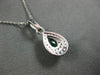 .52CT DIAMOND & AAA EMERALD 14KT WHITE GOLD PEAR SHAPE & ROUND FLOATING PENDANT
