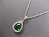 .91CT DIAMOND & AAA EMERALD 18KT WHITE GOLD PEAR SHAPE & ROUND FLOATING PENDANT