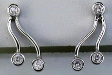 ESTATE .20CT DIAMOND 14KT WHITE GOLD 3D CLASSIC ETOILE DOUBLE WAVE FUN EARRINGS