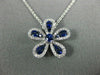 ESTATE .63CT DIAMOND & AAA SAPPHIRE 18KT WHITE GOLD FLOWER FLOATING LOVE PENDANT