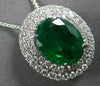 LARGE 4.03CT DIAMOND & AAA EMERALD 18KT WHITE GOLD OVAL & ROUND FLOATING PENDANT