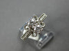ESTATE .59CT DIAMOND 14KT WHITE GOLD ROUND 2 STONE INFINITY FILIGREE LOVE RING