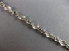 ESTATE .50CT DIAMOND 14K WHITE GOLD BEZEL ETOILE CRISS CROSS FUN TENNIS BRACELET