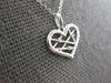 ESTATE .01CT DIAMOND 14K WHITE GOLD ROUND CRISS CROSS HEART FUN FLOATING PENDANT