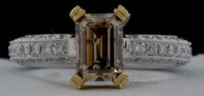 2.02CT WHITE & MOCHA DIAMOND 18KT 2 TONE GOLD BAGUETTE & ROUND ENGAGEMENT RING