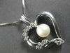 .35CT DIAMOND & AAA SOUTH SEA PEARL 14KT WHITE GOLD OPEN HEART FLOATING PENDANT